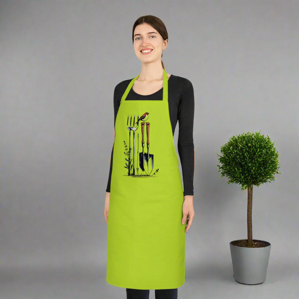 Woman wearing a green apron with gardening tool design on a white background